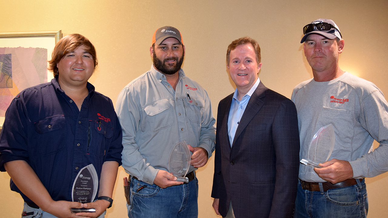 Nathan Enriquez, Justin Griffin and (far right) Kevin Rogers with President and CEO Haley Fisackerly